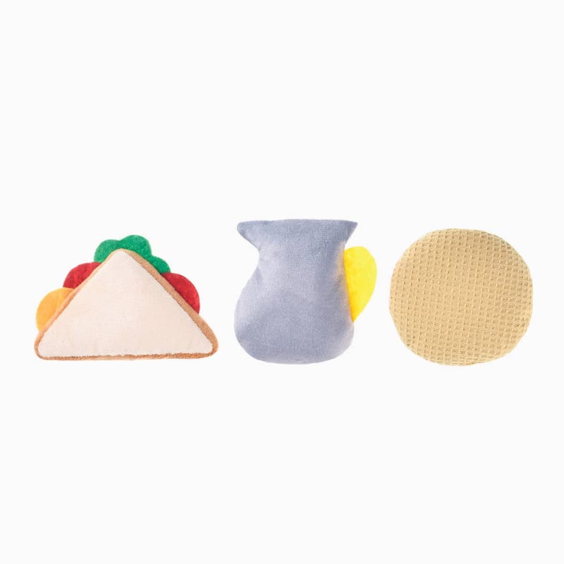 3-piece plush dog toy set: taco, gray fabric piece, beige textured disc