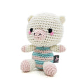 Crochet pig doll toy with cream body, pink snout, and blue-pink striped outfit
