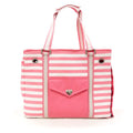 Pink and white striped tote bag with pink front pocket and metal grommet details.