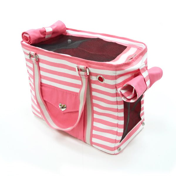 Pink and white striped tote bag showing dark-lined interior and front pocket with ring.