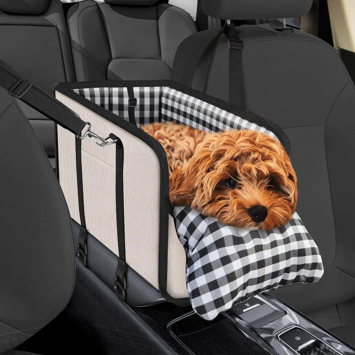 Beige and black plaid pet car seat with cushion, secured by crossbody straps