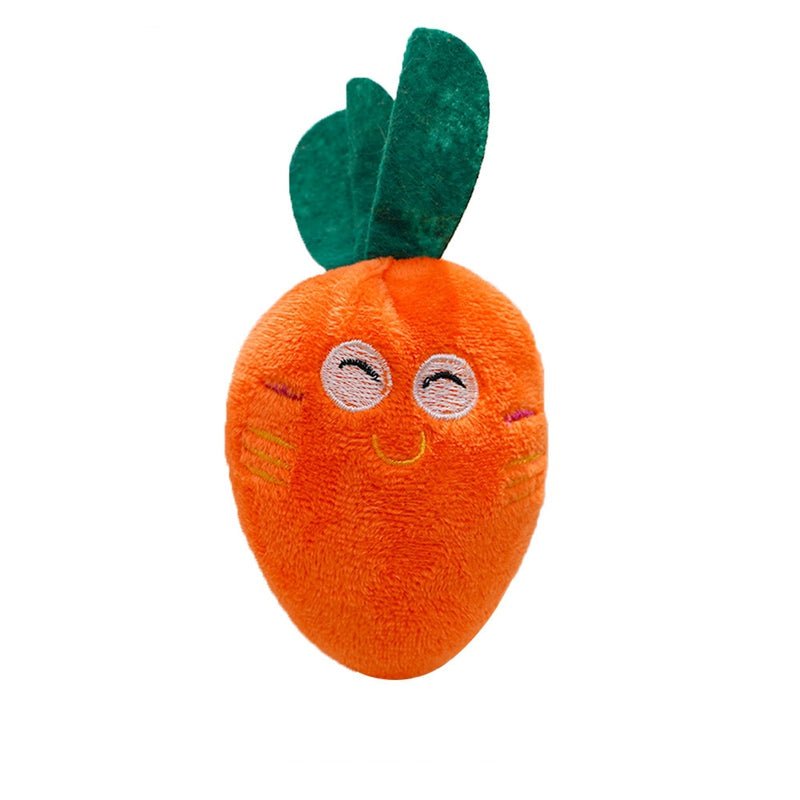 Plush orange carrot-shaped dog chew toy with stitched face and green leaf