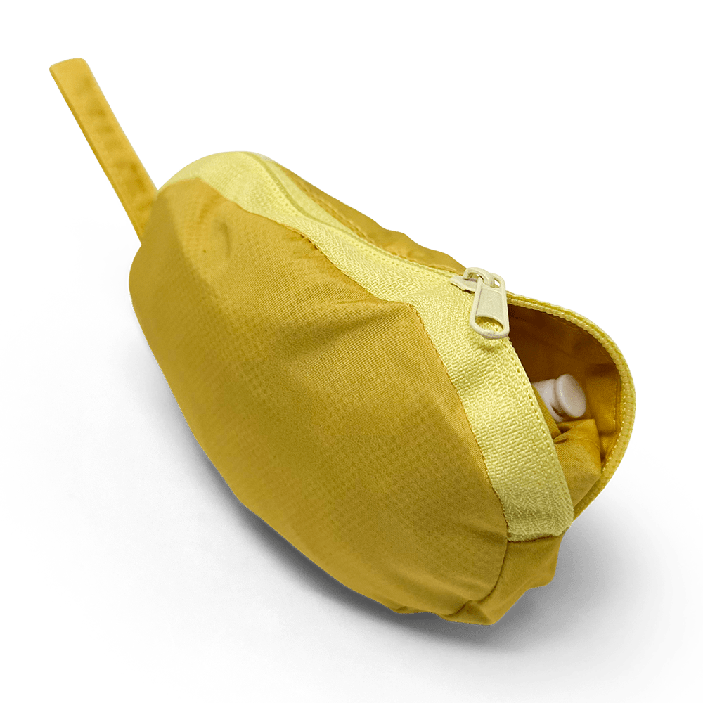 Yellow raincoat pocket with zipper opening, shown in close-up
