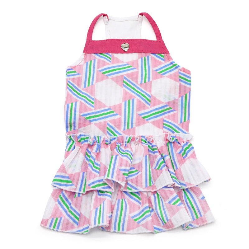 Pet dress front view in pink, white, and multicolor striped hearts with ruffle hem