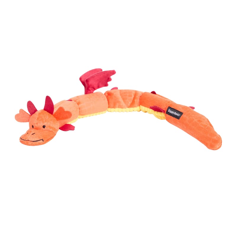 Long orange plush dragon dog toy with squeaker, red head, feet, and curled tail