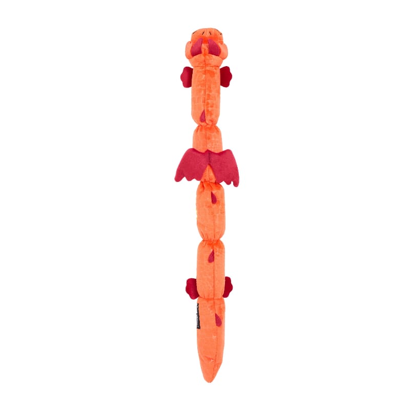 Tall plush dragon dog toy with segmented body, red horned head, and dangling tail