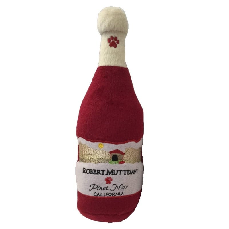 Maroon plush dog toy bottle with cream top, paw emblem, and printed text