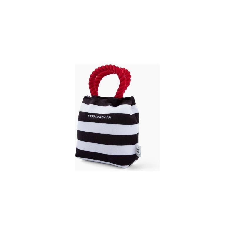 Striped plush shopping-bag dog toy with red rope handle, black and white bands