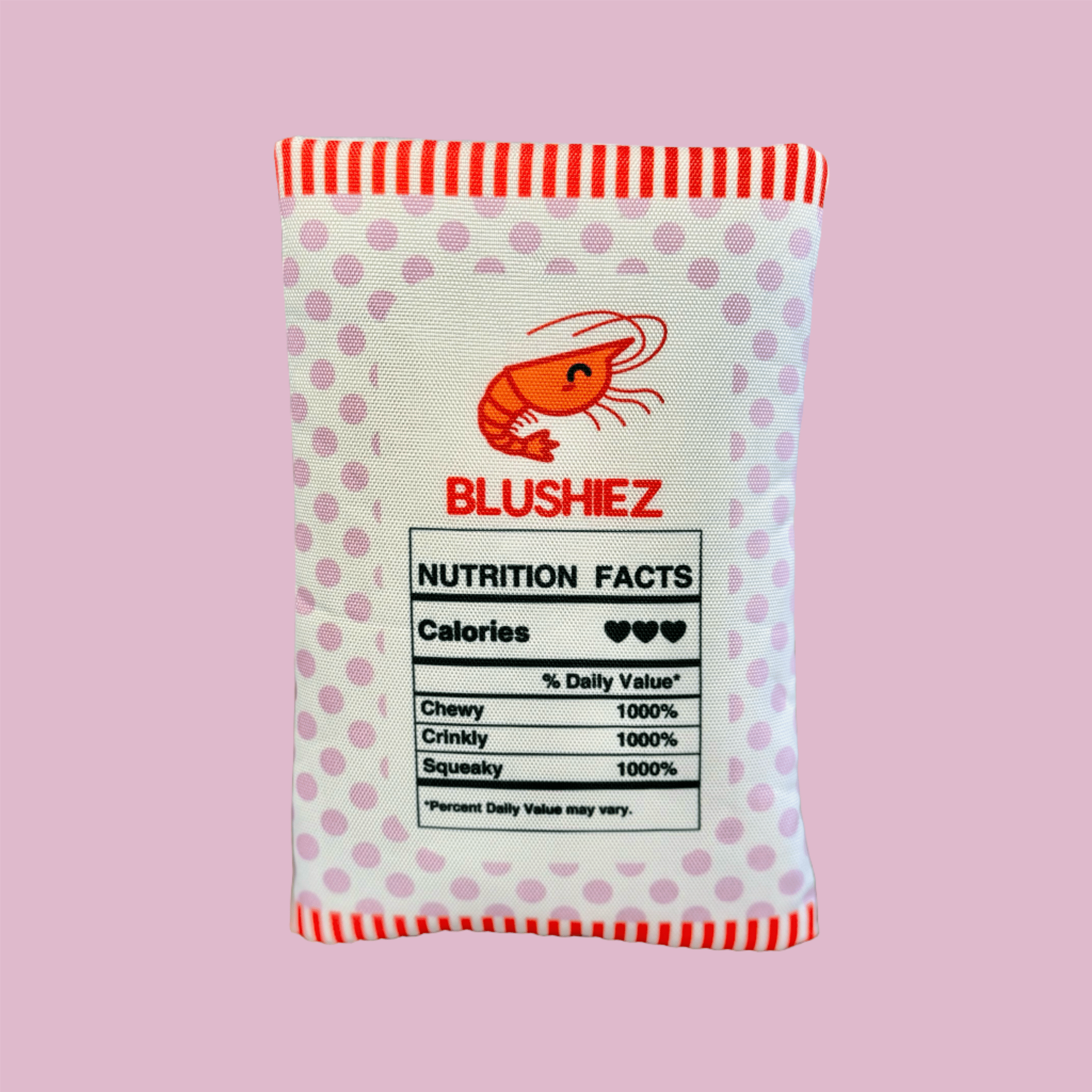 Plush shrimp chip dog toy with nutrition facts label on the back panel