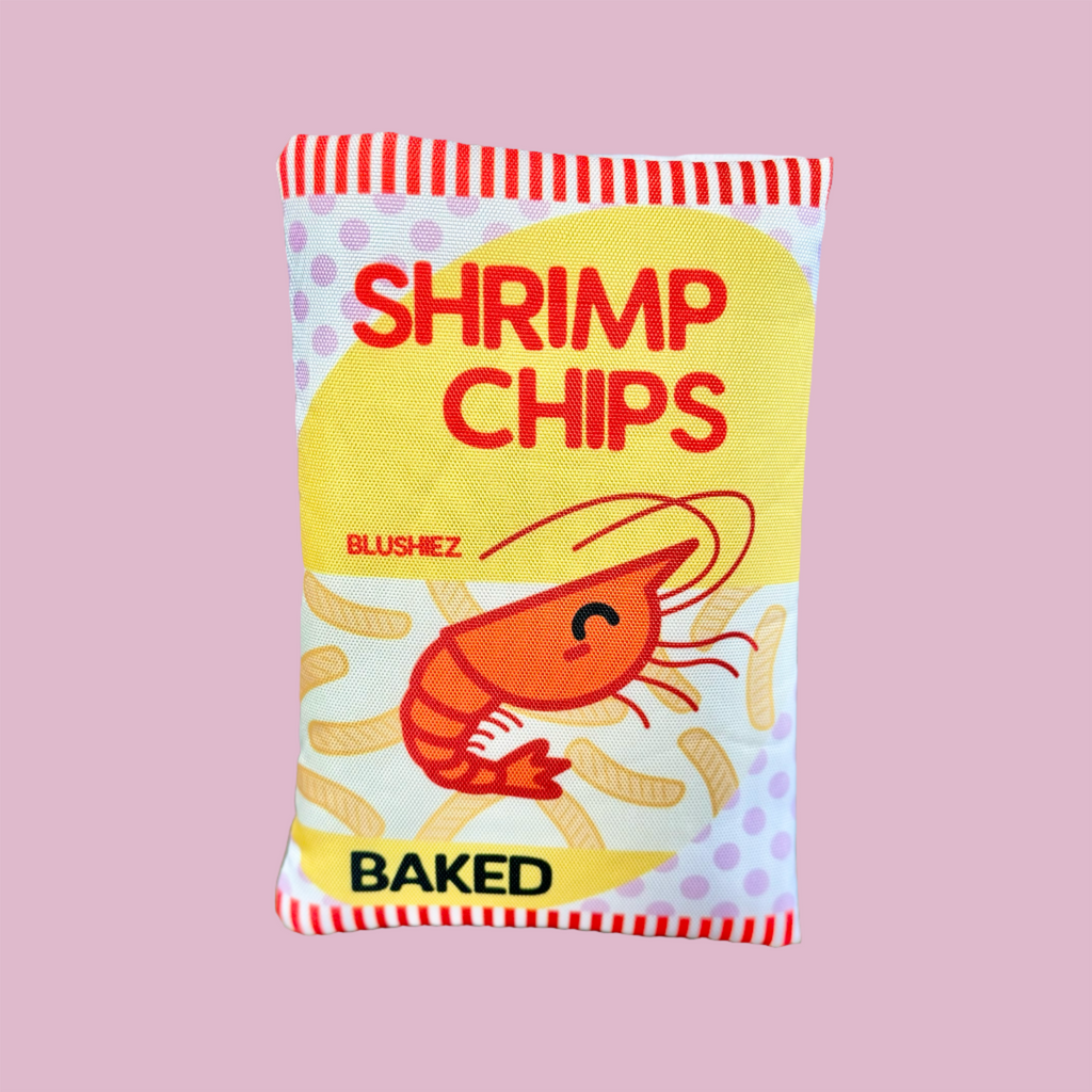 Yellow plush snack pouch dog toy with red striped top and shrimp chips print