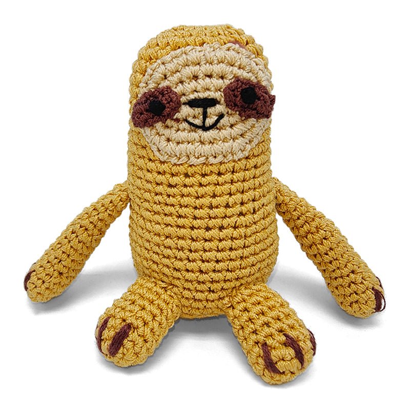 Crocheted sloth plush toy in mustard yellow with beige face and smiling mouth