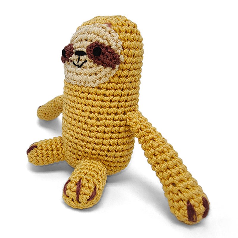 Crocheted sloth plush toy in mustard yellow with beige snout and long dangling arms