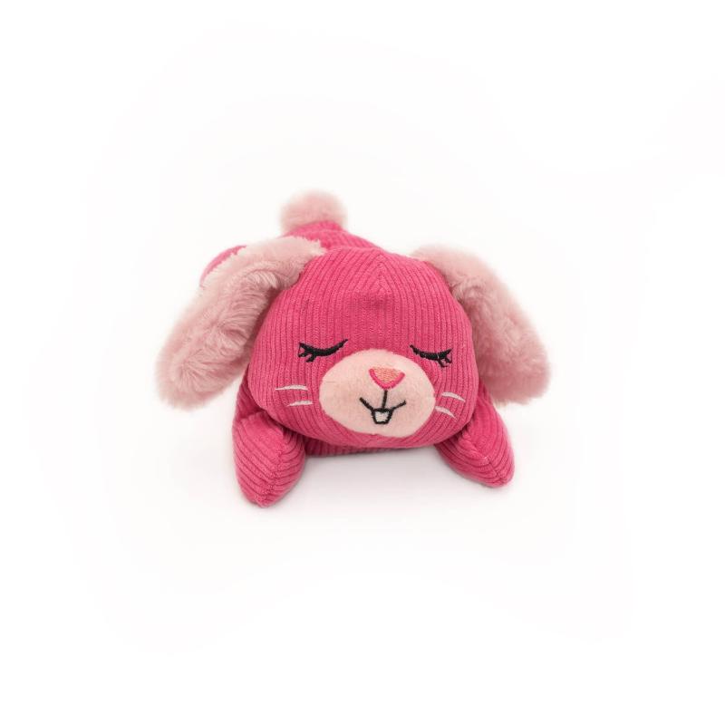 Pink bunny plush dog toy with closed eyes and pink nose, soft blush ear pads