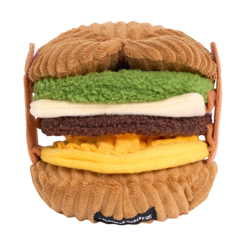 Back view of stacked plush breakfast sandwich dog toy with brown bun and layered fillings