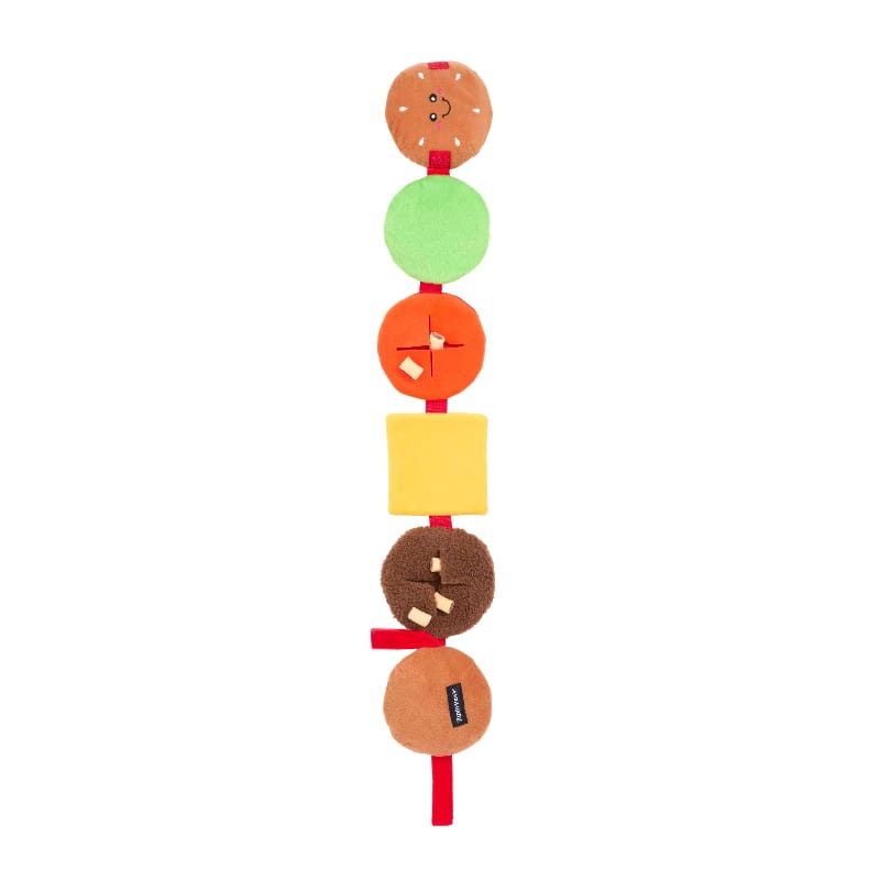 Dangling interactive plush dog toy with stacked bun, cheese, lettuce, patty and red tassel