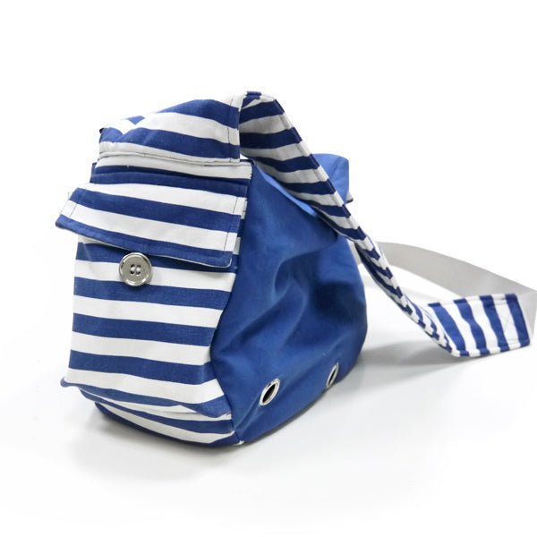Soft sling bag in blue with white-and-navy striped front panel and button detail