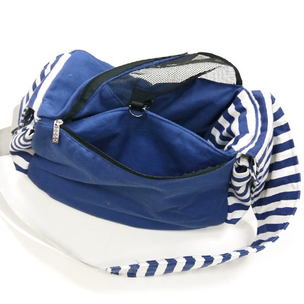 Blue soft sling bag open with mesh panel, zip closure, and striped lining