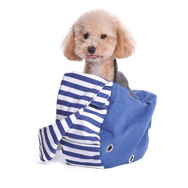 Blue soft sling bag with striped fabric front panel and small metal grommets