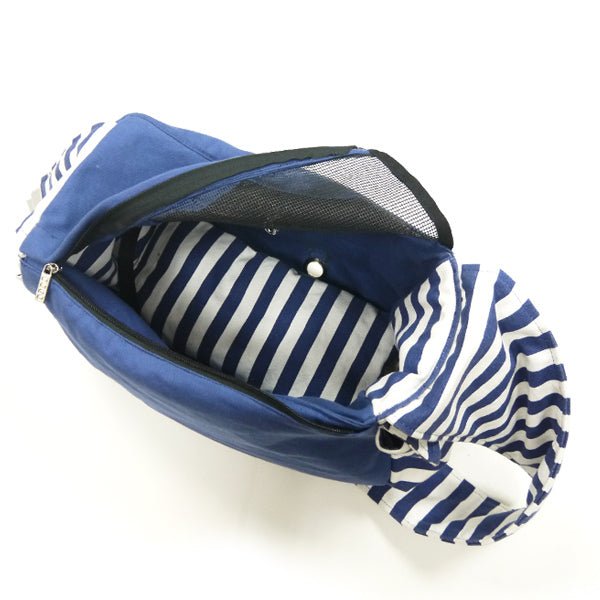 Blue soft sling bag open view showing striped lining and mesh top panel