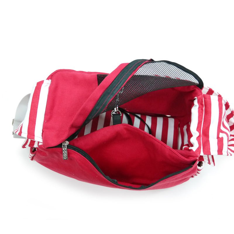 Red soft sling bag with black zipper pocket and striped interior lining