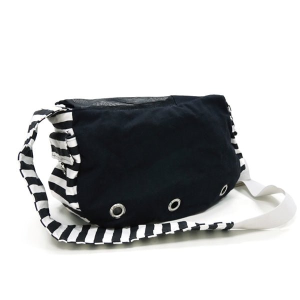 Soft sling bag in black with white-and-black striped trim and white shoulder strap