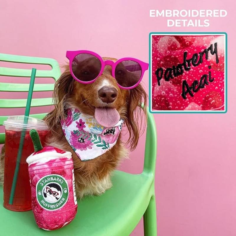 Plush drink-cup dog toy with green straw, Starbarks logo; red/pink plush, shown with dog