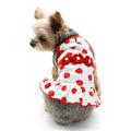 White dog dress with red strawberry print, red trim, and bow with rhinestone accents