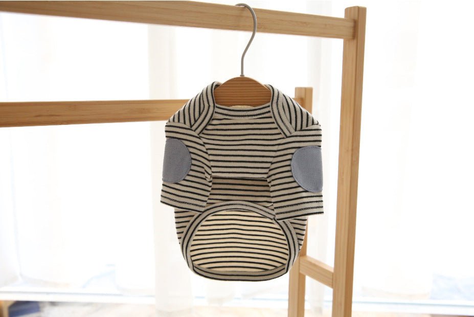 Light striped dog base-layer hoodie on hanger with gray paw-patch accents and hood