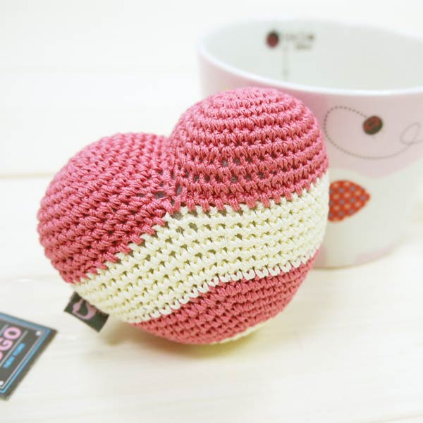 Striped pink and cream crochet heart toy with sewn label