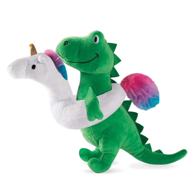 Green plush dinosaur dog toy with white unicorn floaty and pink pom tail, squeaker