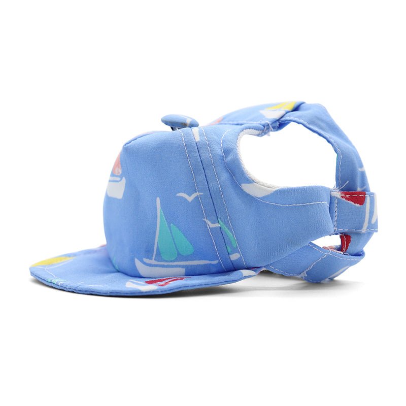 Light blue cap-style beach hat with sailboat print and curved brim
