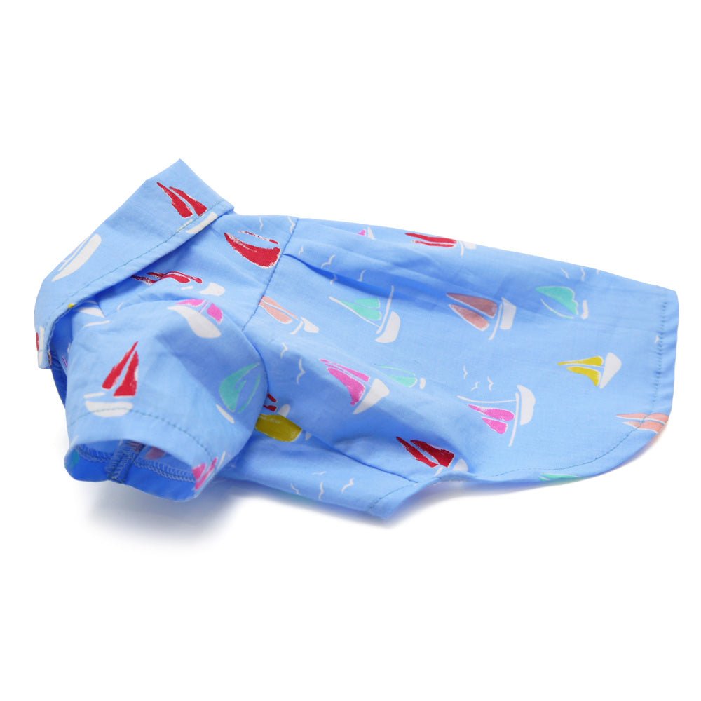 Light blue pet shirt with sailboat print, side view showing short sleeves