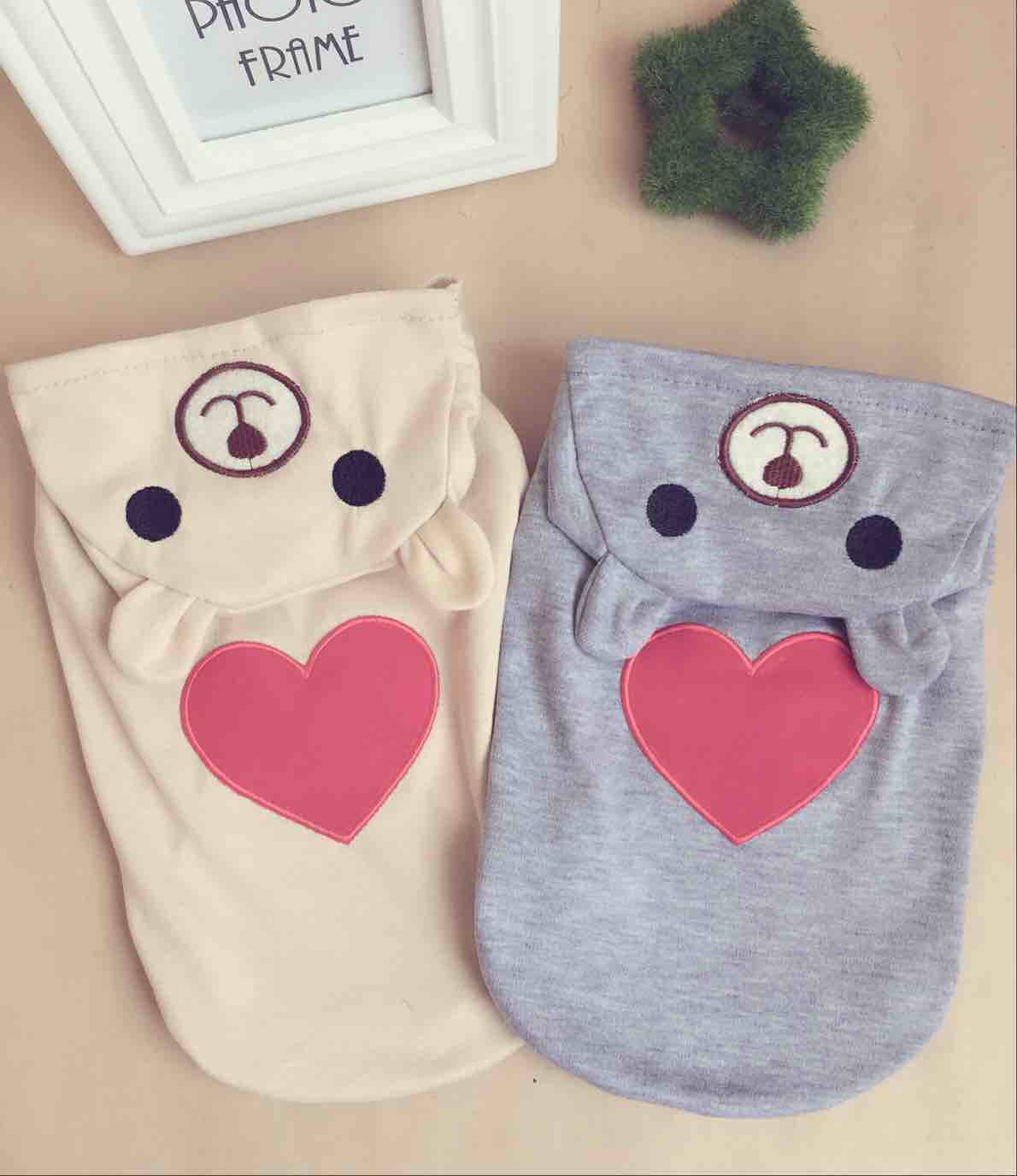 Cream and light gray pet hoodies with bear icon, pink heart front, gathered collar