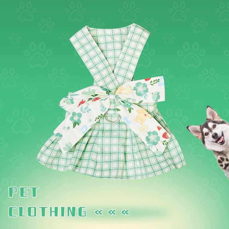Green plaid pet dress harness with floral bow and metal D-ring and leash