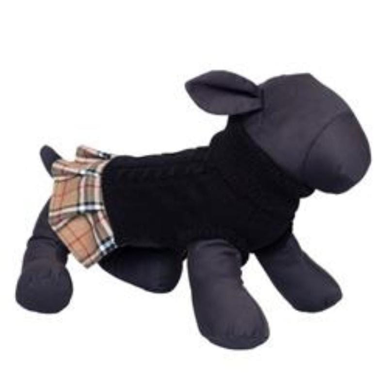 Dog wearing black turtleneck sweater dress with tan plaid layered hem and plaid collar