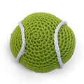Crocheted tennis ball toy in green with white seam lines