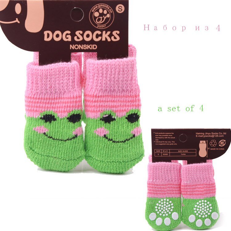 Pink-and-green dog socks with smiling faces and non-skid dotted soles; set of 4