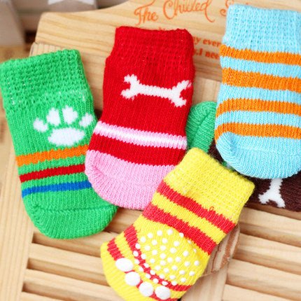 Assorted kids dog-themed socks set: green dinosaur, red bone, yellow dots, blue stripes