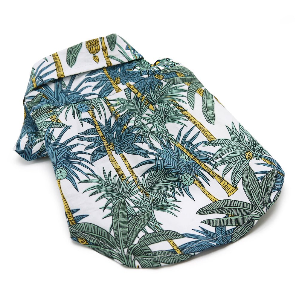 Teal and green tropical leaf pet shirt with yellow accents, button placket, short sleeves