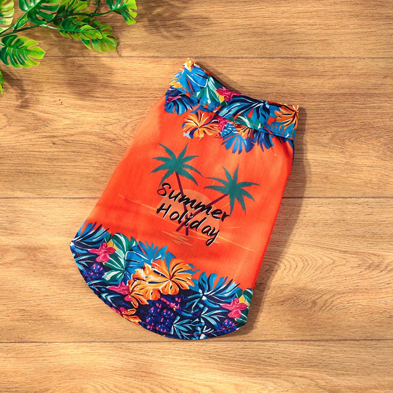 Orange summer holiday dog shirt with palm leaf and hibiscus floral print