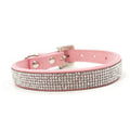 Pink pet collar with silver rhinestone band and metal buckle hardware