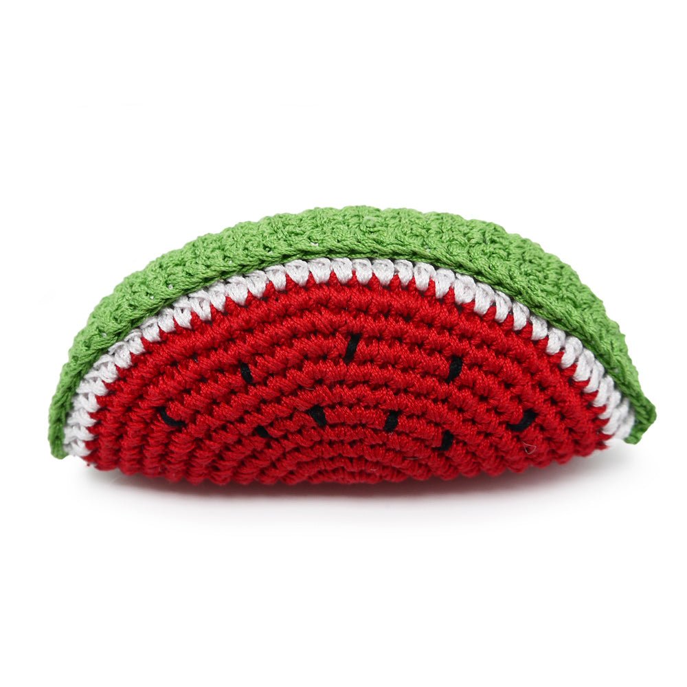 Crochet watermelon toy half-moon with red textured stripes and green outer rind