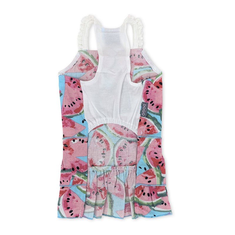 White pet sundress with pink and teal watermelon print, flutter straps, and ruffled waist