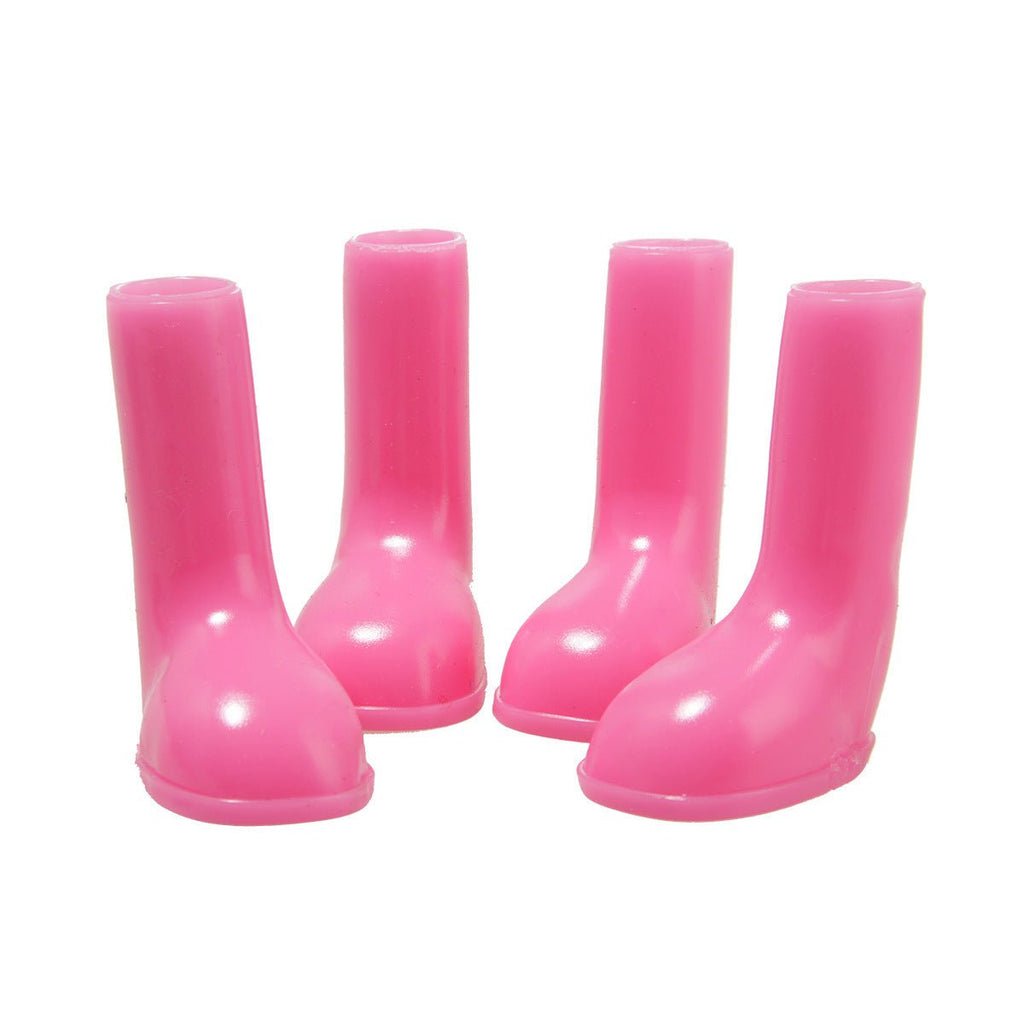 Pet waterproof rain shoes in bright pink, pair of booties with thick soles