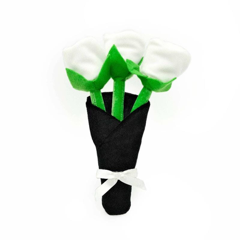 Plush rose bouquet dog toy with white petals, green leaves and black fabric base
