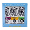 3-pack seltzer-style dog toys in blue box, three paw-themed can designs