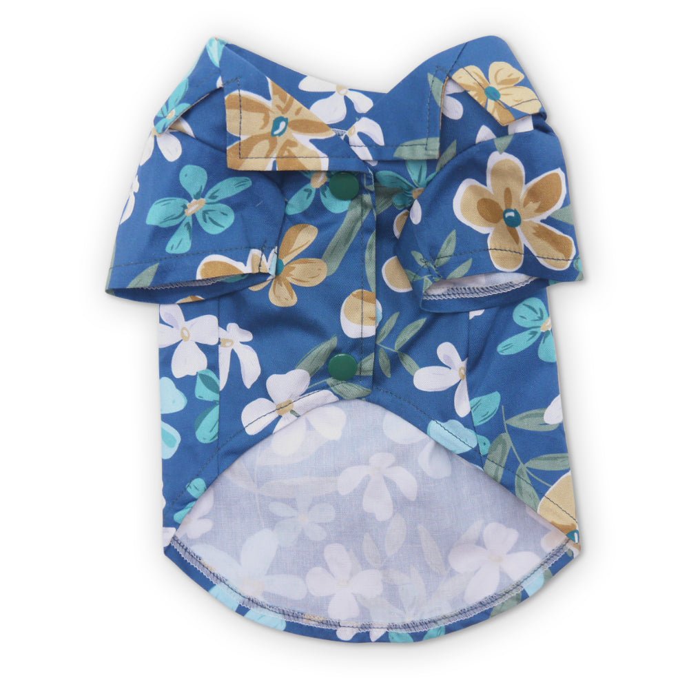 Blue floral dog shirt with short sleeves and a back yoke, laid flat.