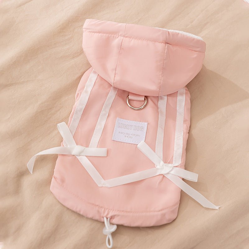 Pink fleece dog vest with hood, ribbon straps, and adjustable drawstring