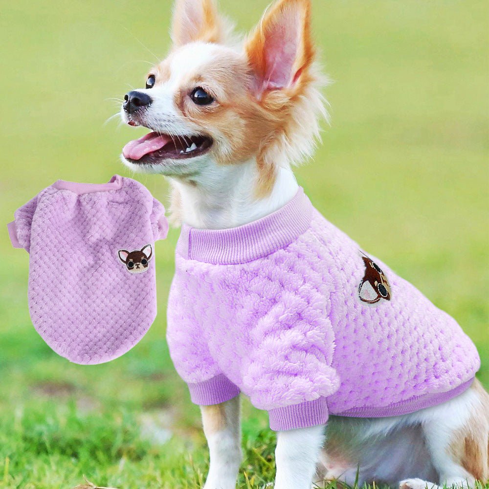 Purple knitted dog jacket with turtleneck, ribbed cuffs, and cartoon dog face patch