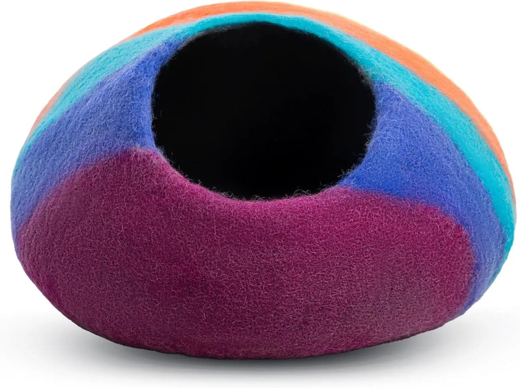 Rainbow wool felt cat cave bed with round entrance hole, blue and purple striped sides.